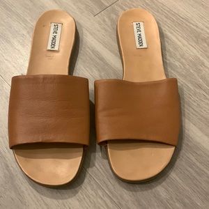 Worn 1-2x. Steve Madden slides size 9.5 fit like a 9.